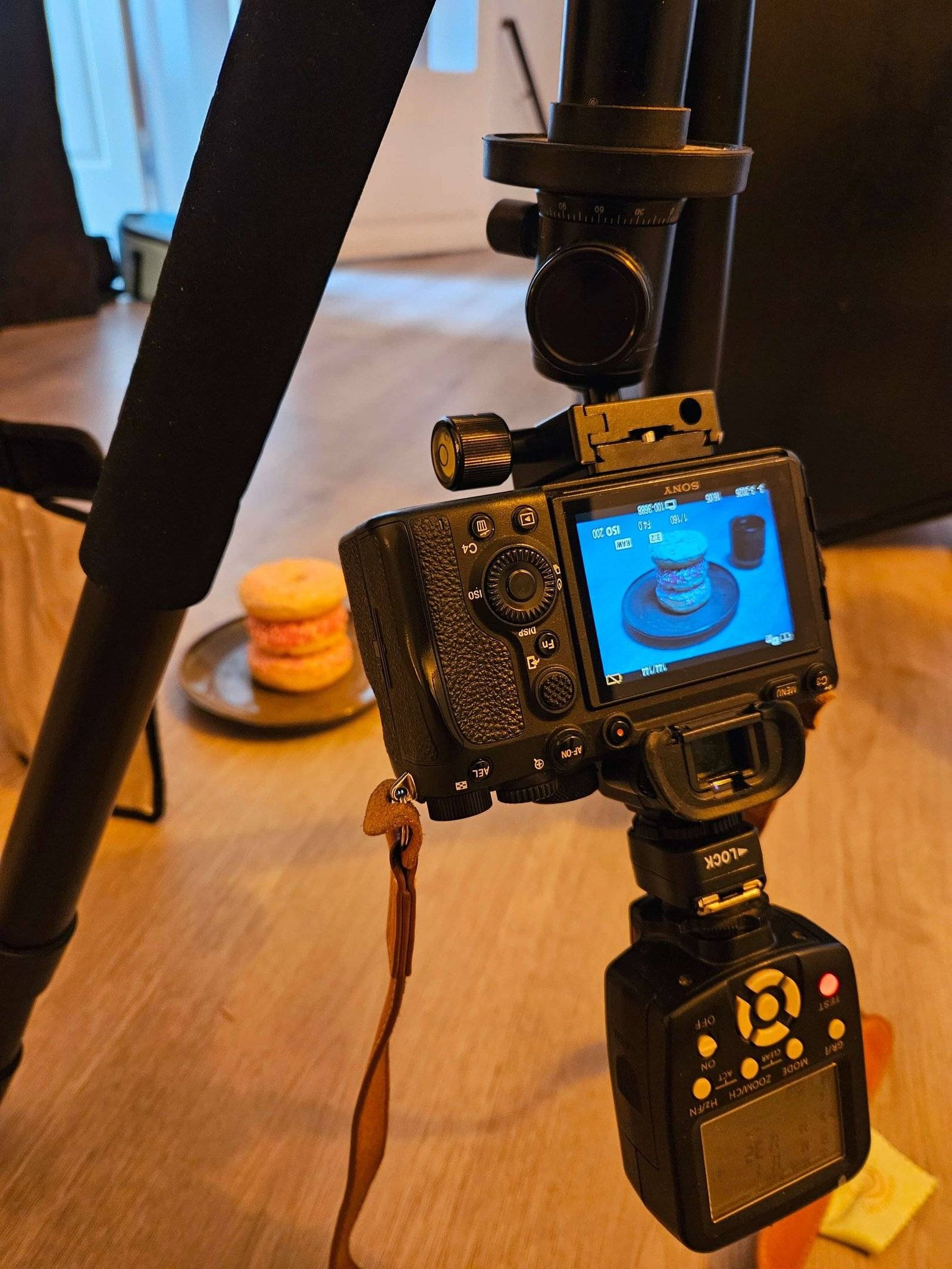 Behind the scenes: the camera on a tripod, facing the donut